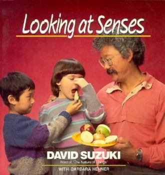 Paperback Looking at Senses Book