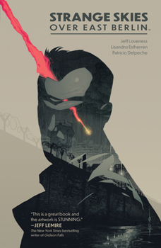 Paperback Strange Skies Over East Berlin Book