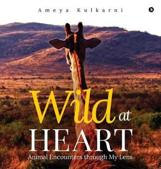 Hardcover Wild at Heart: Animal Encounters through My Lens Book