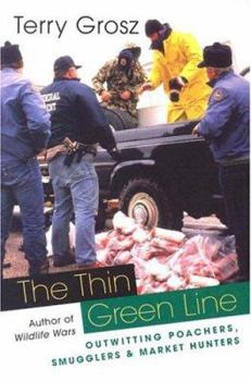 Paperback The Thin Green Line: Outwitting Poachers, Smugglers, and Market Hunters Book