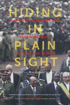 Hardcover Hiding in Plain Sight: The Pursuit of War Criminals from Nuremberg to the War on Terror Book