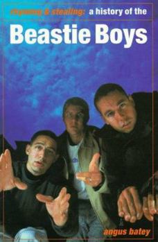 Paperback Rhyming & Stealing: A History of the Beastie Boys Book