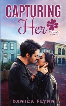 Paperback Capturing Her Book