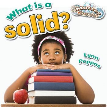 Paperback What Is a Solid? Book