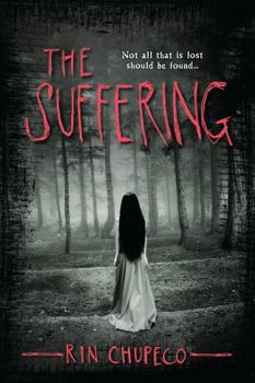 Paperback The Suffering Book