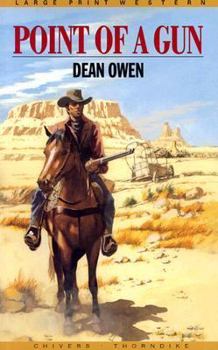 Paperback Point of a Gun: A Rangeland Action Novel [Large Print] Book