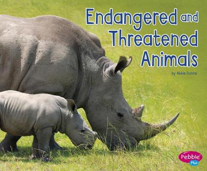 Paperback Endangered and Threatened Animals Book