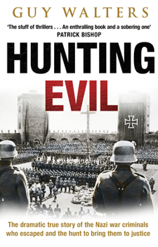 Paperback Hunting Evil Book