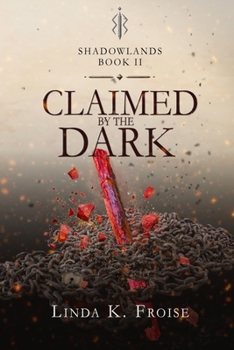 Paperback Claimed by the Dark Book