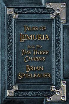 Paperback The Three Charms Book