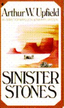 Paperback Sinister Stones Book