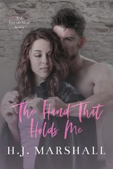 Paperback The Hand That Holds Me Book