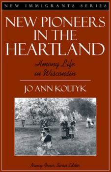 Paperback New Pioneers in the Heartland: Hmong Life in Wisconsin (Part of the New Immigrants Series) Book