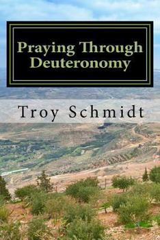 Paperback Praying Through Deuteronomy Book
