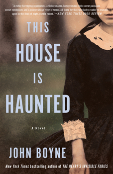 Paperback This House Is Haunted Book