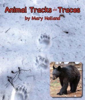Paperback Animal Tracks & Traces Book