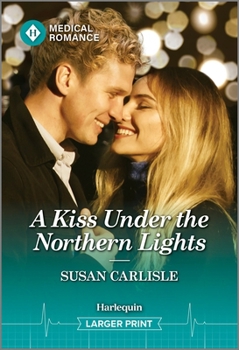 Mass Market Paperback A Kiss Under the Northern Lights [Large Print] Book