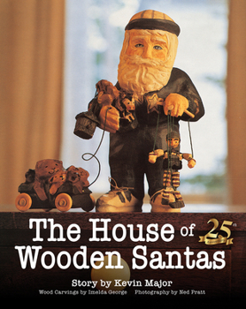Paperback The House of Wooden Santas Book