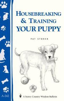 Paperback Housebreaking & Training Your Puppy: Storey's Country Wisdom Bulletin A-242 Book