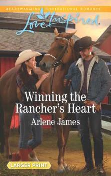 Mass Market Paperback Winning the Rancher's Heart [Large Print] Book