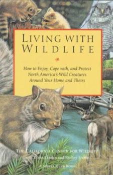Paperback Living with Wildlife Book