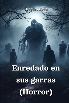 Paperback Enredado en sus garras (Horror) [Spanish] Book