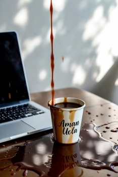 Paperback Aman Uola Book