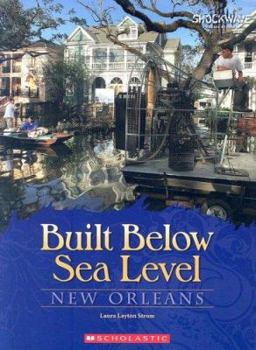 Paperback Built Below Sea Level: New Orleans Book
