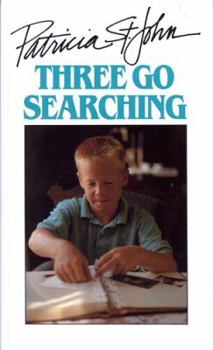 Paperback Three Go Searching Book