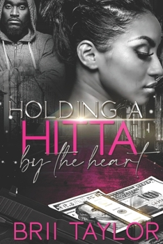 Paperback Holding A Hitta By The Heart Book