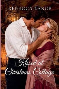 Paperback Kissed at Christmas Cottage Book