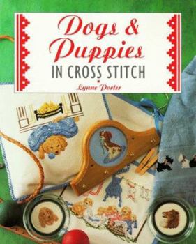 Paperback Dogs & Puppies in Cross Stitch Book