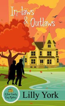 Paperback In-Laws & Outlaws (a Door County Cozy Mystery Book 1) Book