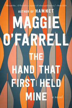 Paperback The Hand That First Held Mine Book