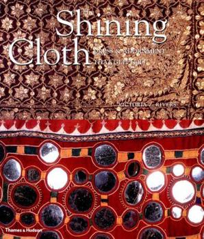Paperback The Shining Cloth: Dress and Adornment That Glitter Book
