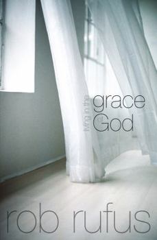 Paperback Living in the Grace of God Book