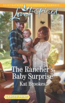Mass Market Paperback The Rancher's Baby Surprise [Large Print] Book