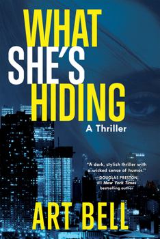 Paperback What She's Hiding: A Thriller Book