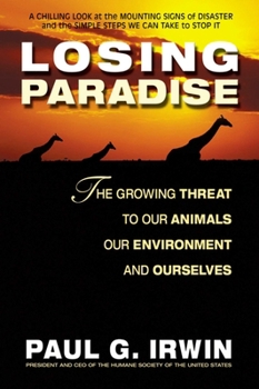 Paperback Losing Paradise: The Growing Threat to Our Animals, Our Environment, Book