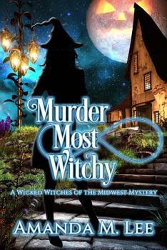 Paperback Murder Most Witchy Book