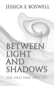 Paperback Between Light and Shadows Book