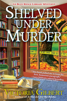 Paperback Shelved Under Murder: A Blue Ridge Library Mystery Book