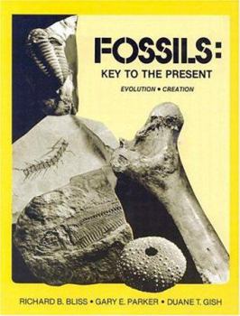 Paperback Fossils, Key to the Present: Evolution, Creation Book