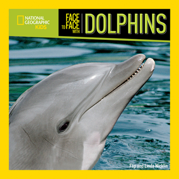 Paperback Face to Face with Dolphins Book
