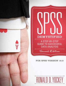 Paperback SPSS Demystified: A Simple Guide and Reference Book