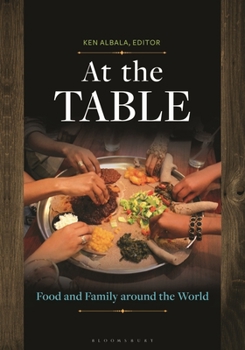 Paperback At the Table: Food and Family Around the World Book