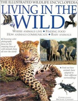 Paperback Living in the Wild (Illustrated Wildlife Encyclopedia) Book