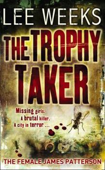Paperback The Trophy Taker Book