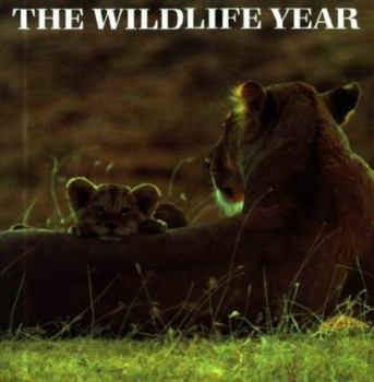Hardcover The Wildlife Year: Life Cycles of Nature Around the World Book