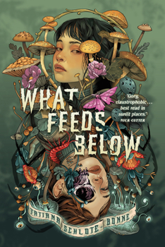 Paperback What Feeds Below Book